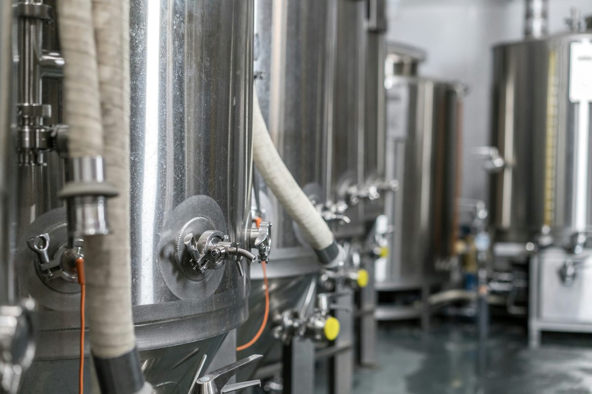 Stainless steel fermentation tanks in a brewery